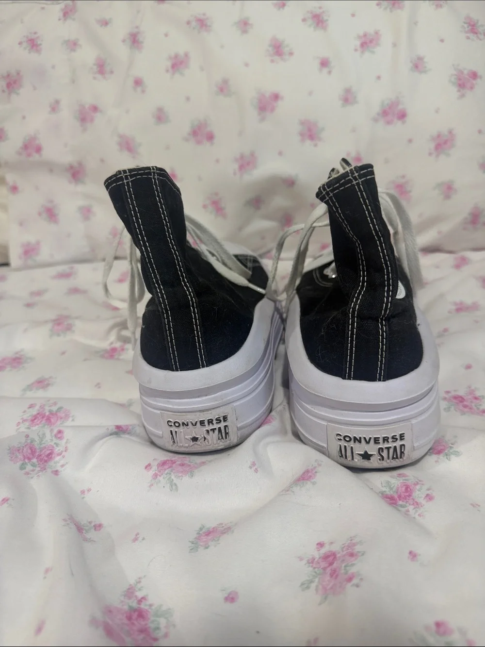 Converse women’s Black High-Top Platform Sneakers with White Laces
